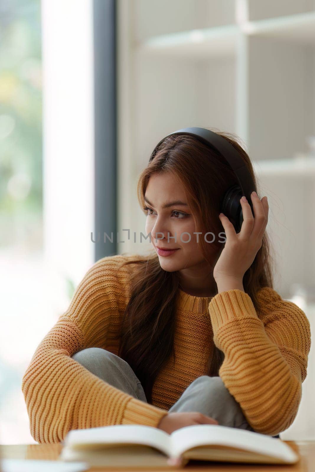 Beautiful young Asian woman college student at classroom. College student working on the college campus. back to school concept.