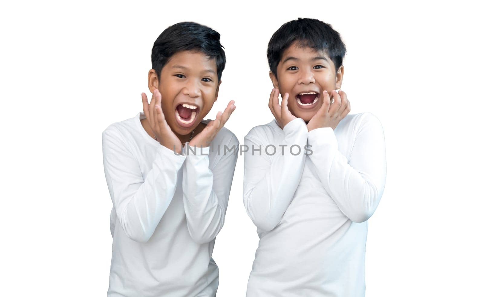 Brothers wearing white long-sleeved T-shirts smile and show joy together.