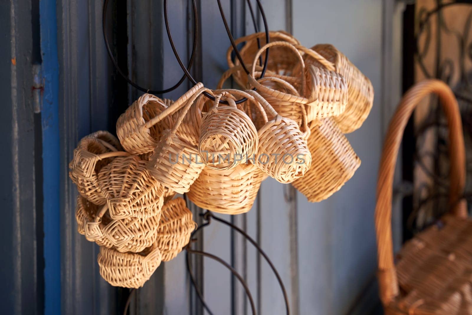 Tiny traditional souvenir wicker baskets on sale in Nice, France