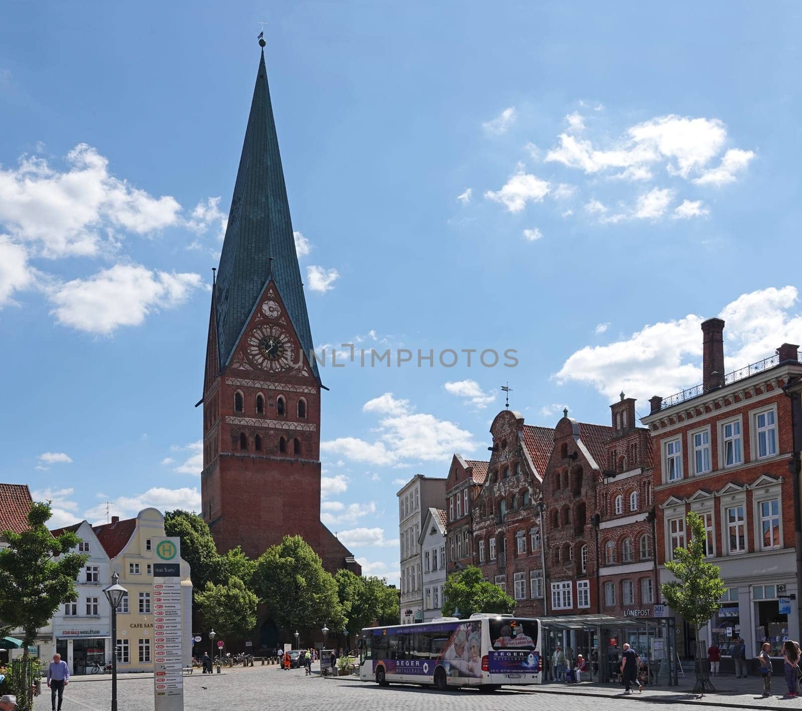Lüneburg, Germany - July 7, 2023 Historical square in Lueneburg (Lüneburg) called Am Sande with a view on the St. John's Church