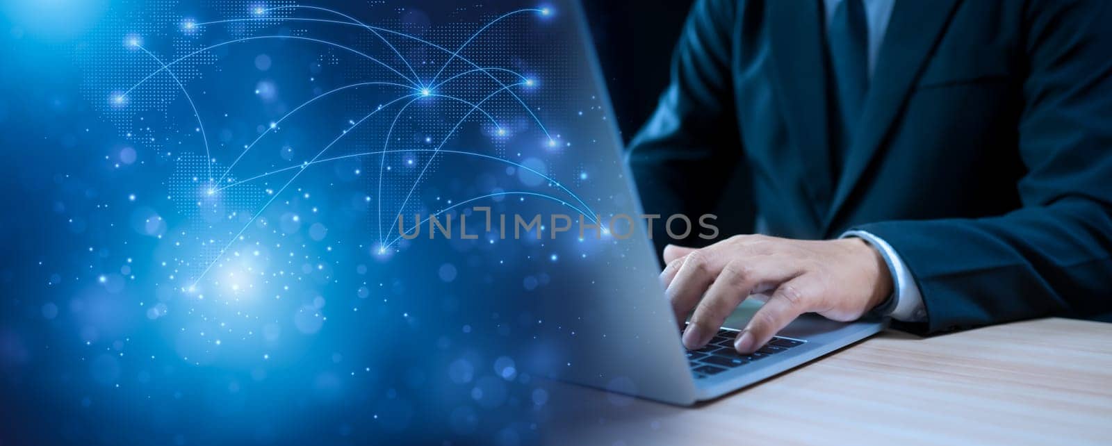Businessman working on computer connecting business network. Network concept. Global business concept. Information exchange concept. by Unimages2527