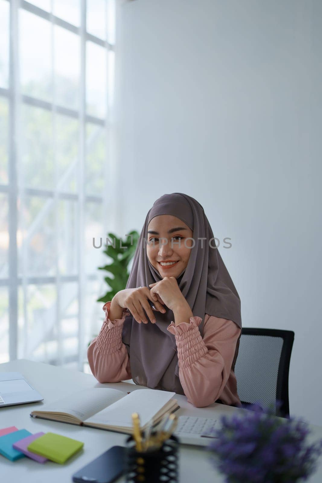 Business, finance and employment, female successful entrepreneurs concept. Confident smiling Muslim woman by Manastrong