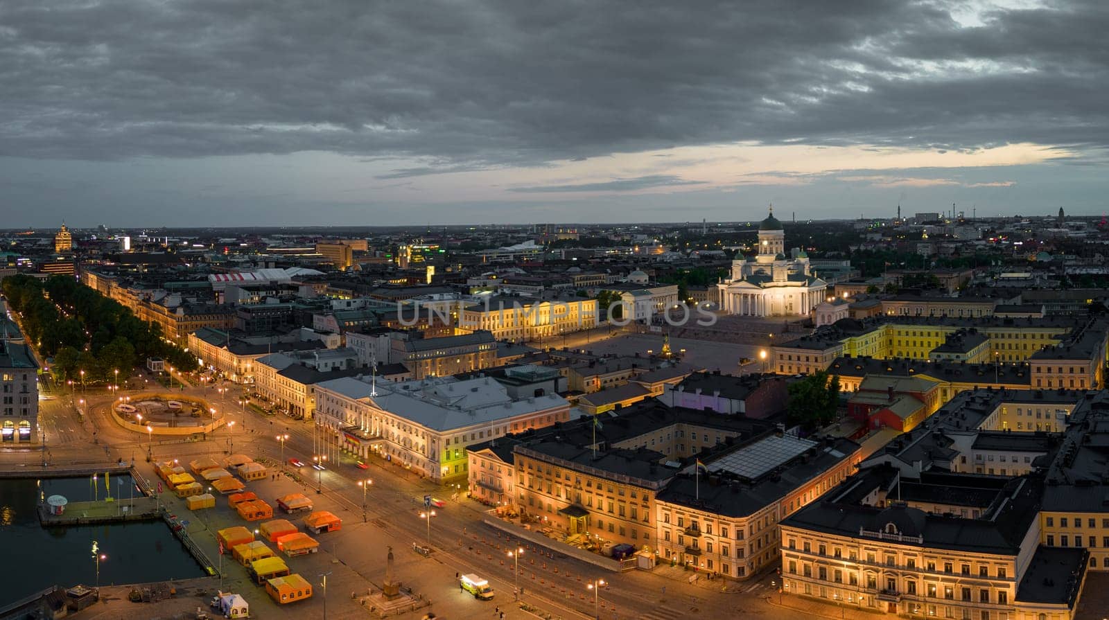 Helsinki Cathedral and Market Square by lit government buildings at dawn by Osaze