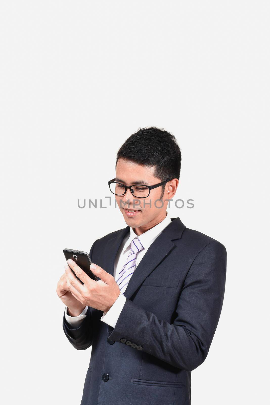 businessman checking emails on the phone