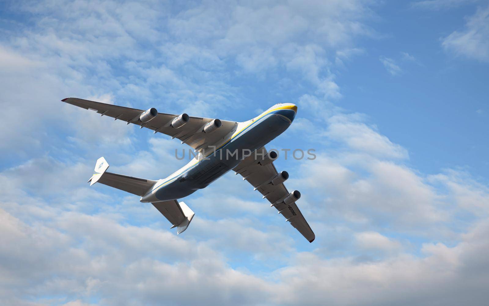 KYIV, UKRAINE - Aug 24, 2021: Celebrating the 30th anniversary of Ukraine independence. The plane Antonov 225 AN-225 Mriya, the biggest airplane in the world in the sky over Kyiv during the parade