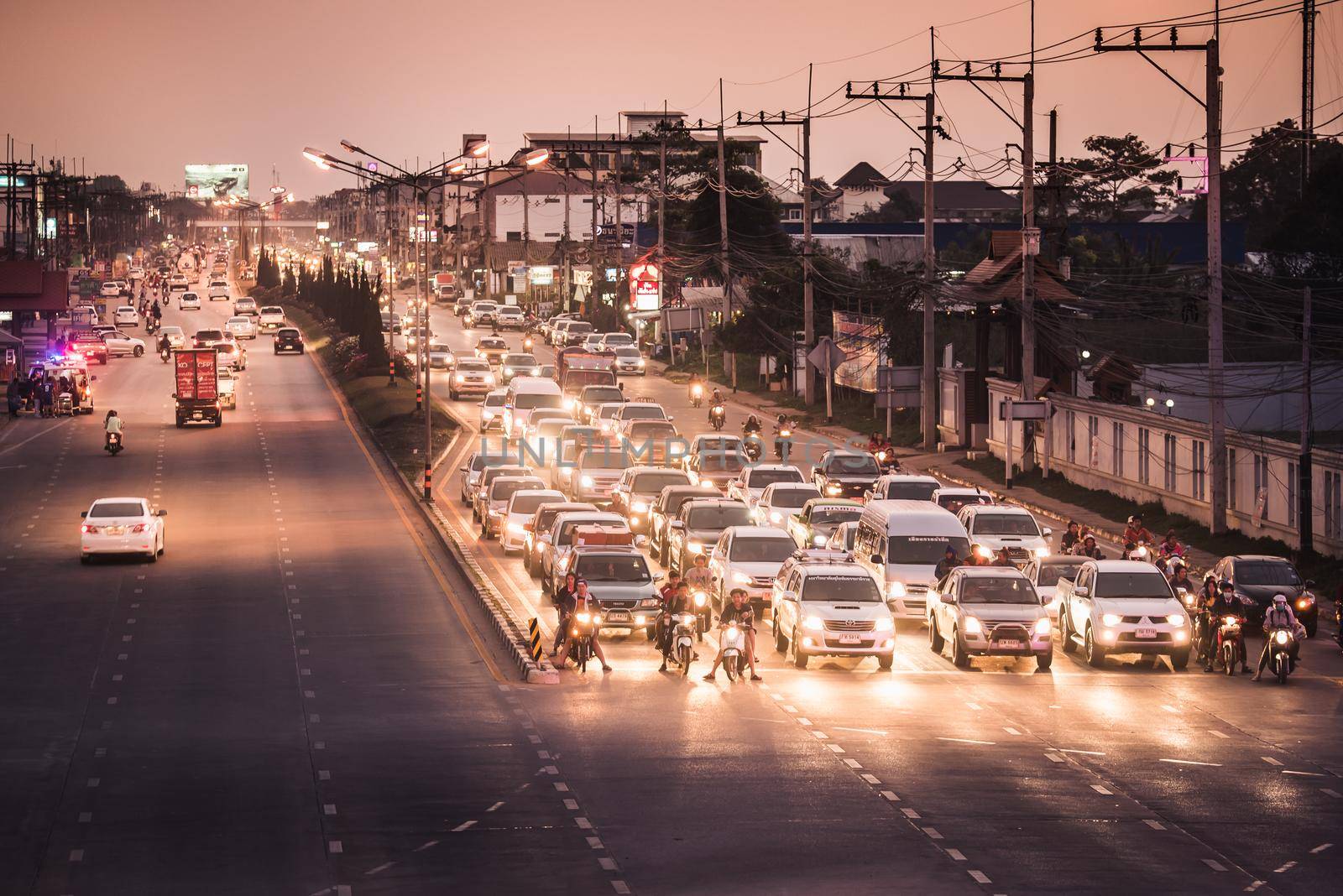 Thailand, Chiang rai - February 5 2016: Evening road traffic in Chiang rai