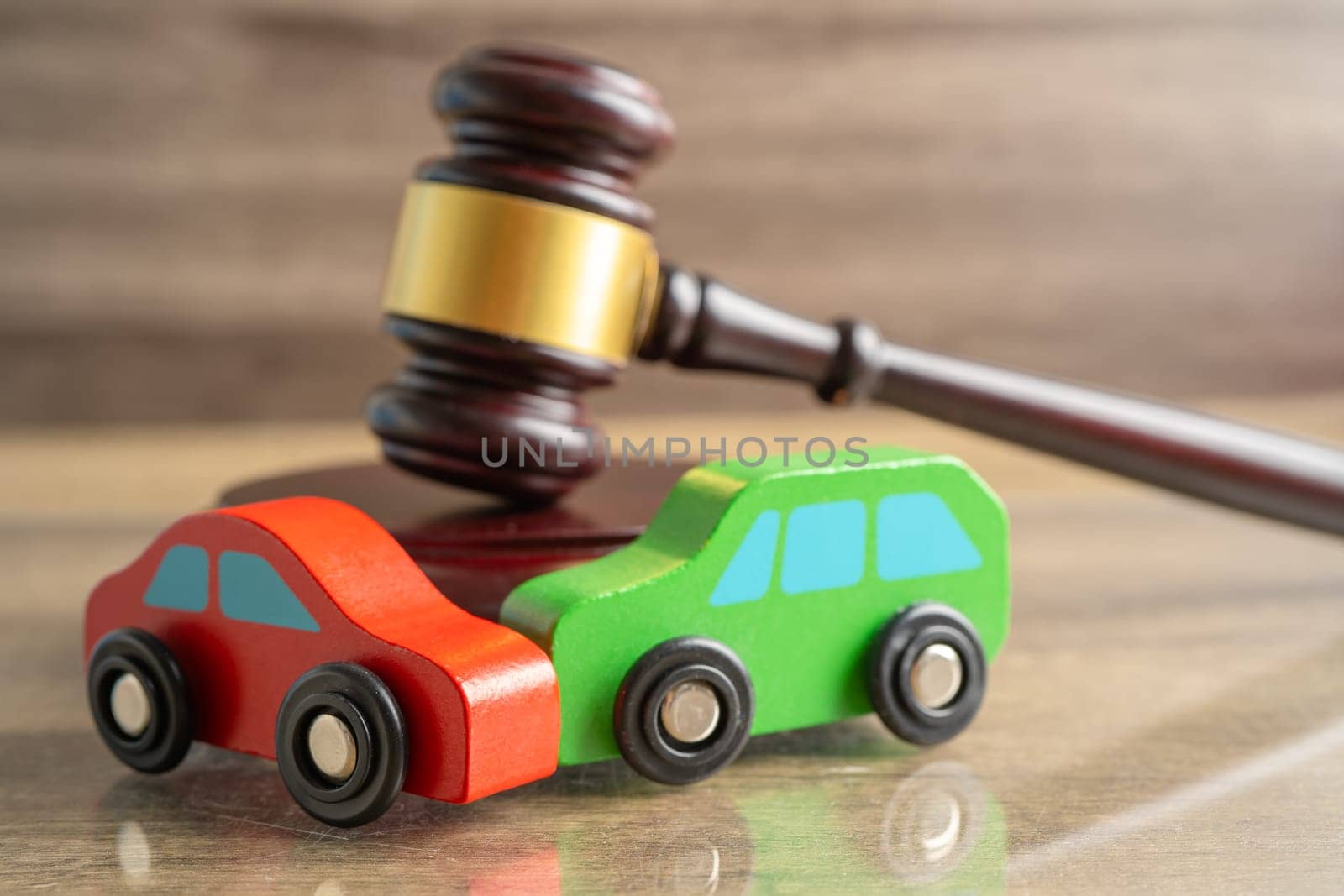 Hammer gavel judge with car vehicle accident, insurance coverage claim lawsuit court case. by pamai