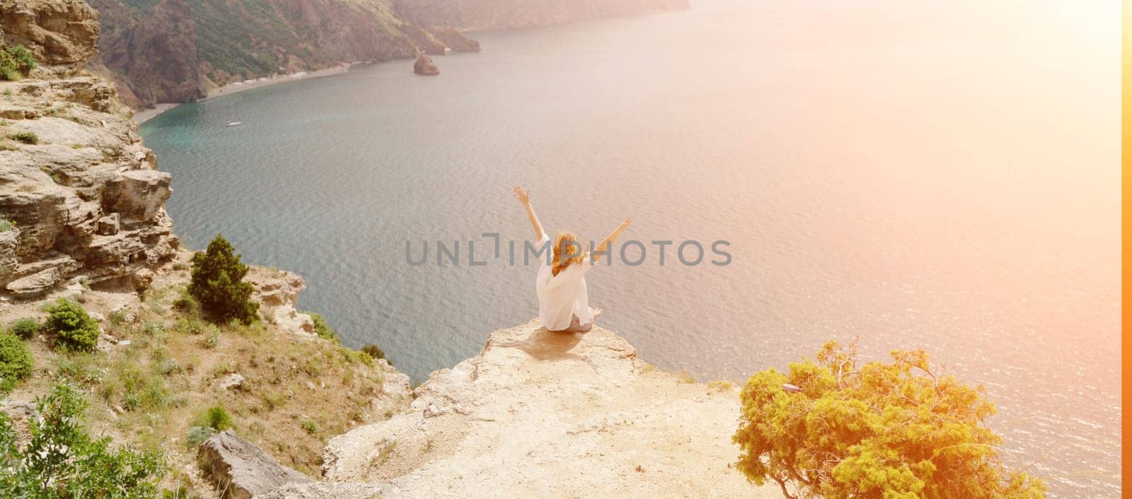 Woman travel summer sea. Portrait of a happy woman on a background of beautiful sea. Rear view of a woman in a white shirt. Freedom and happiness by Matiunina