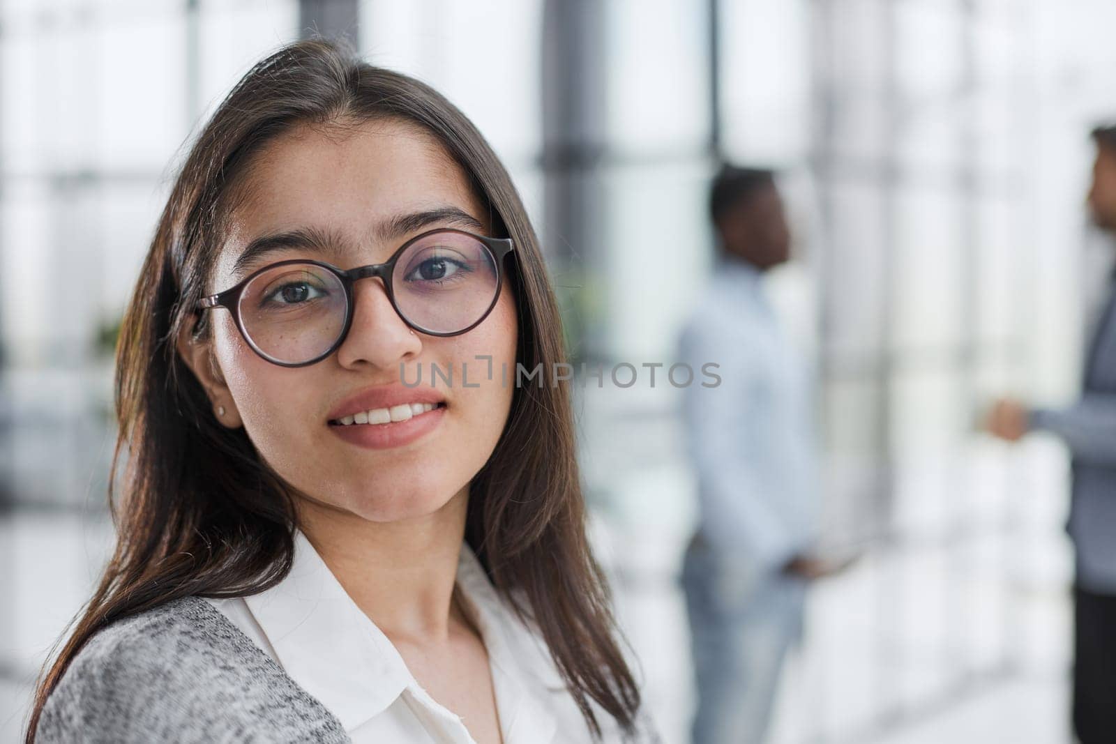 Portrait of girl leader or manager at a team planning