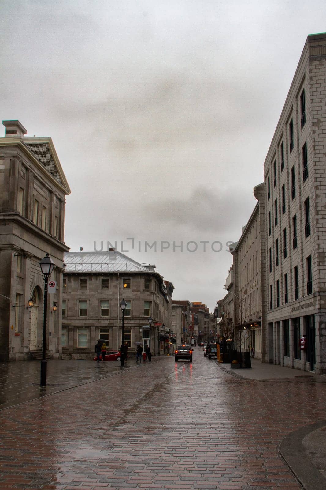 Empty streets on Saint Paul Street near Bonsecours Market on a rainy day, Old Montreal by Granchinho
