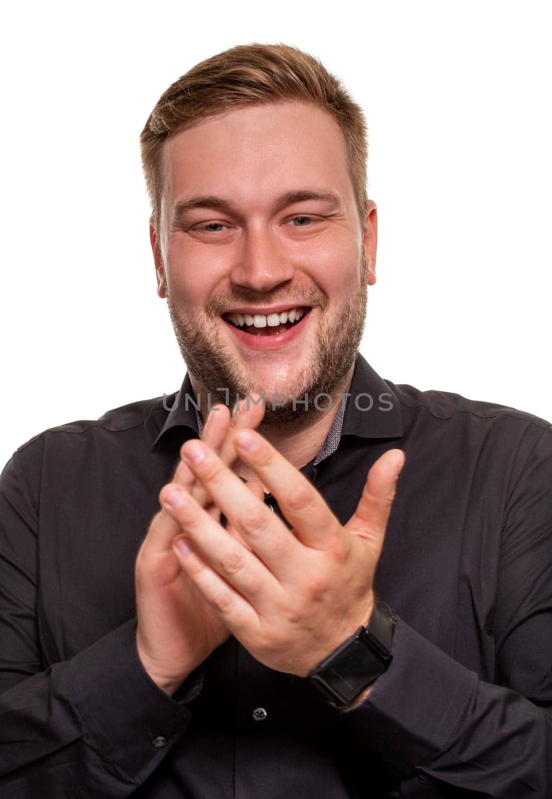 Thrilled excited and over-emotive attractive happy guy smiling broadly gasping and screaming from joy and happiness gesturing with palms clapping hands from surprise and rejoice by nazarovsergey