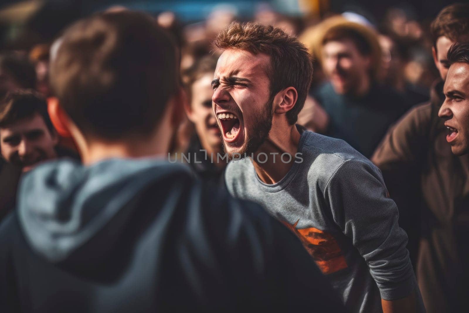 A passionate young man expressing his anger and frustration through shouting and gesturing