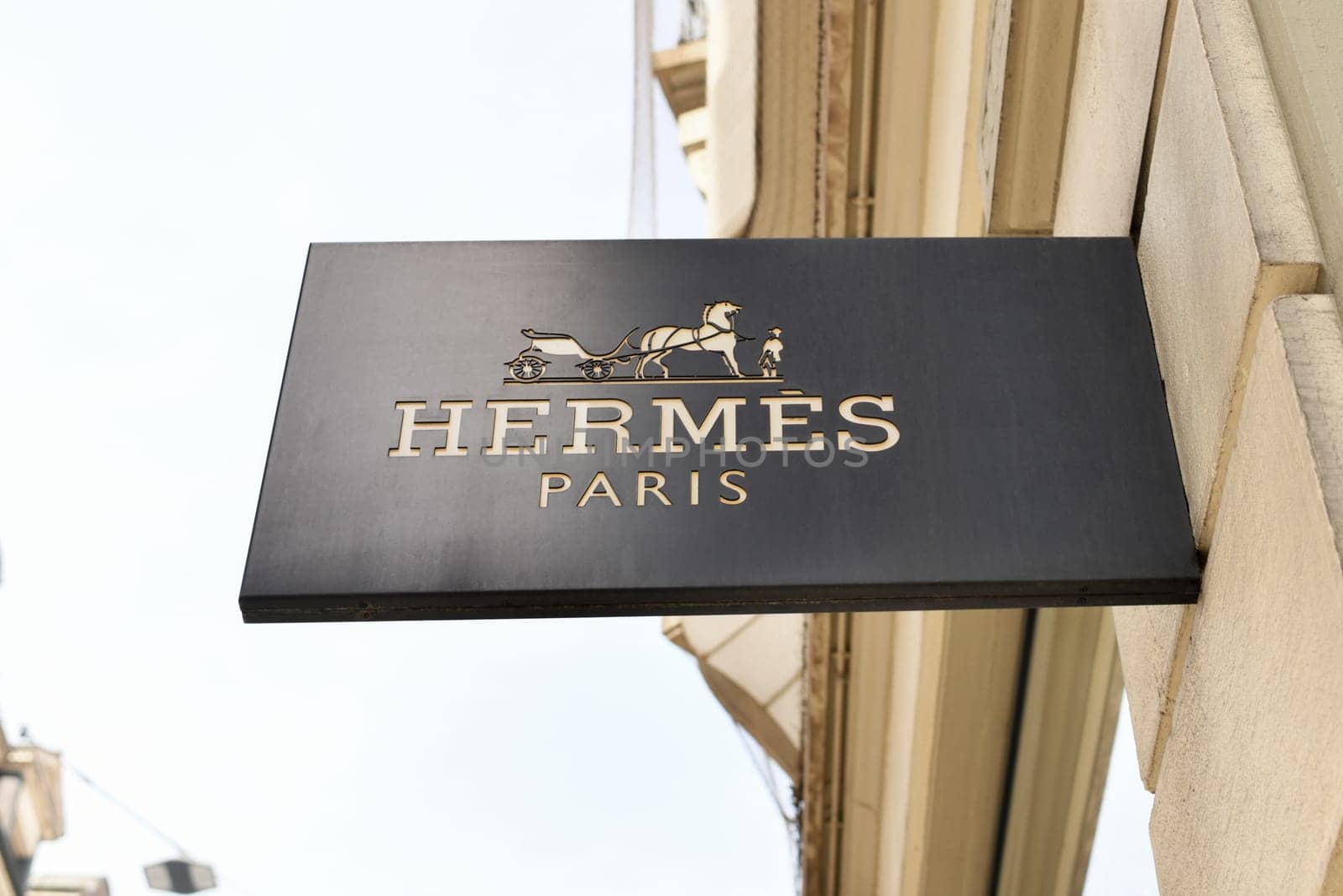 Lausanne, Switzerland - August 24 ,2022 : Signboard at the luxury store Hermess with logo