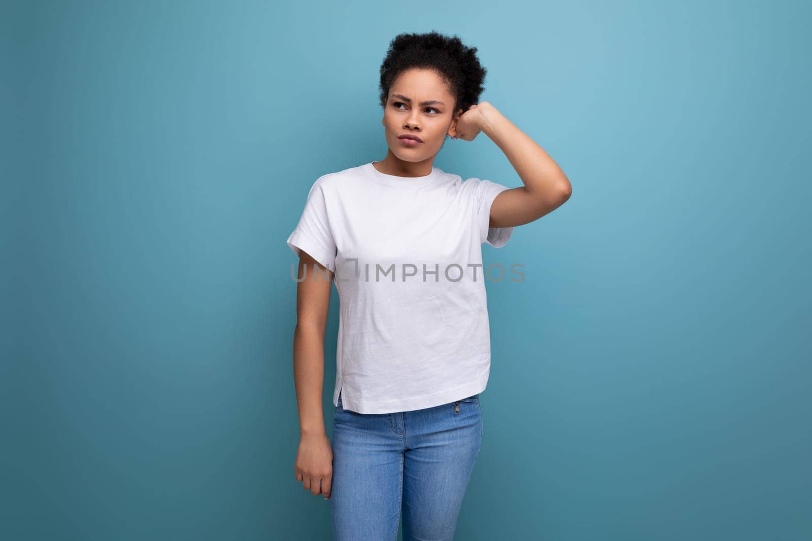 young charming latin woman dressed in white tank top with blank space for logo printing.