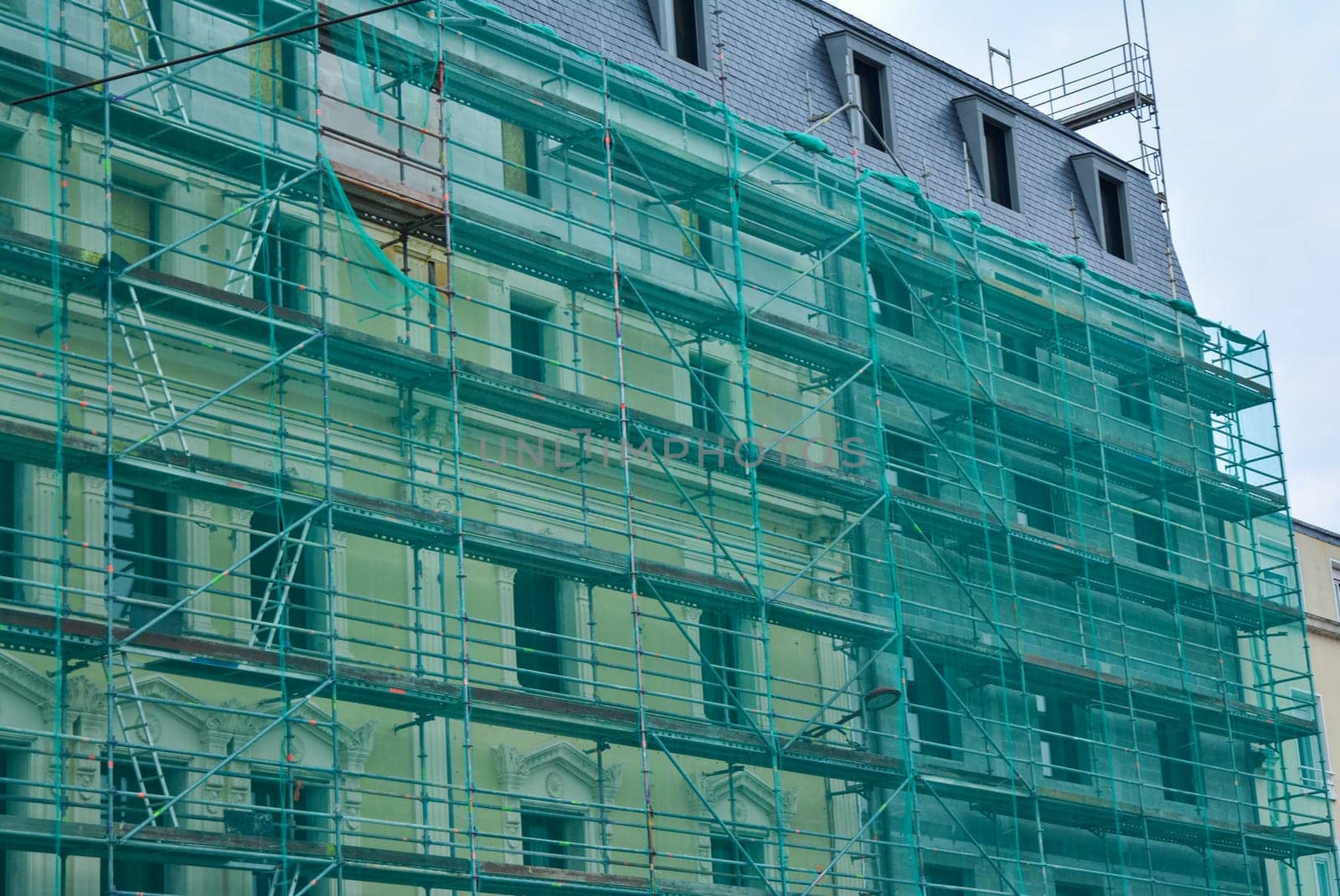 Construction scaffolding of a building under renovation.