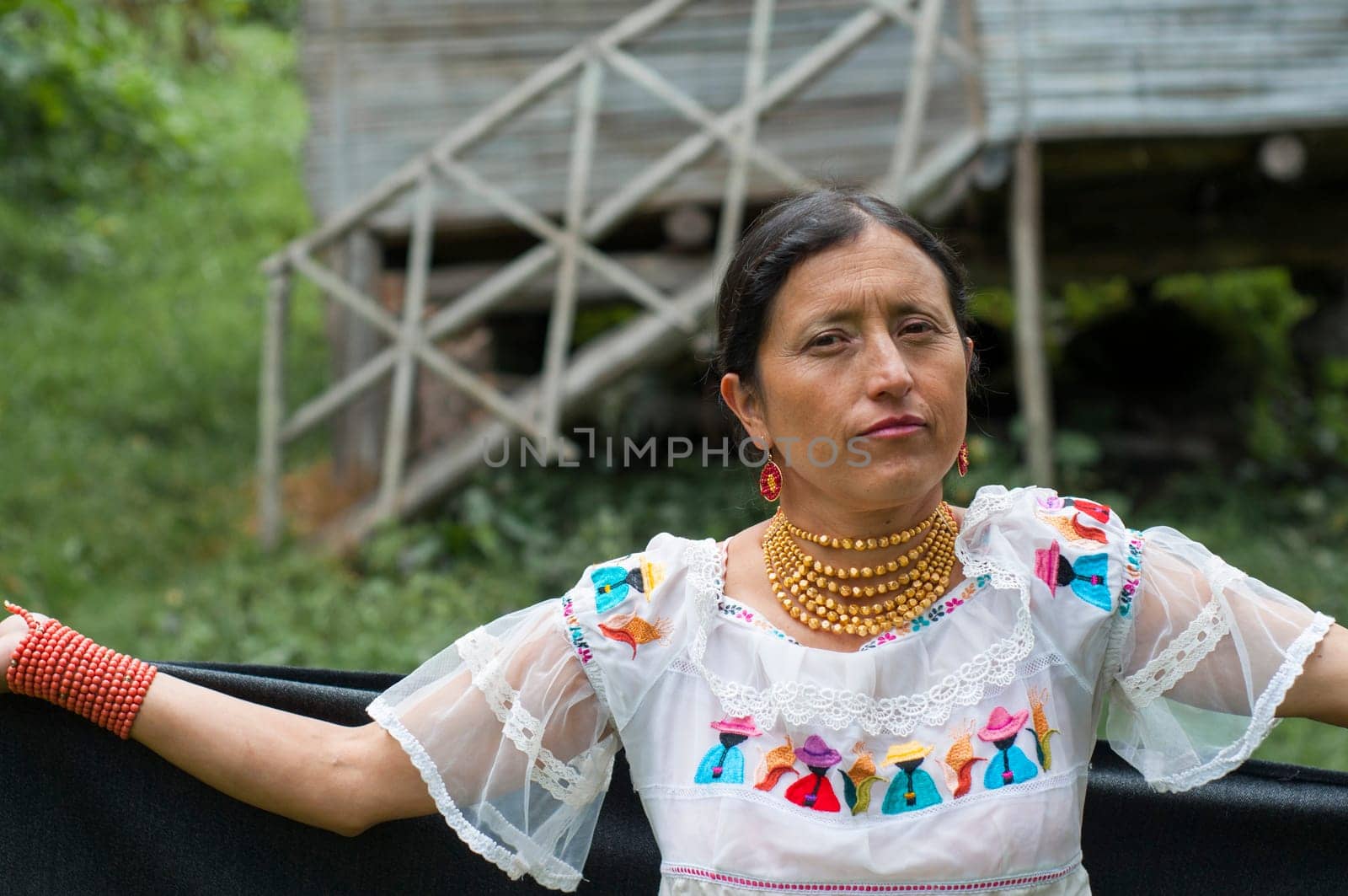indigenous old woman in traditional dress prepared for an ancestral cleaning ceremony. High quality photo