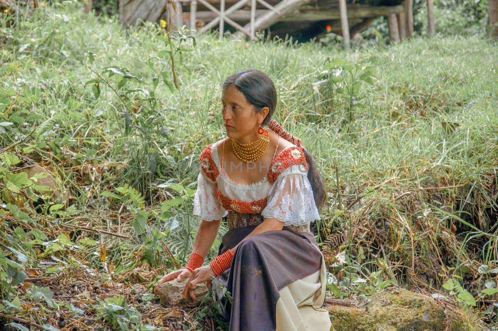 indigenous people working in the jungle in a traditional South American dress surrounded by peace and harmony. High quality photo