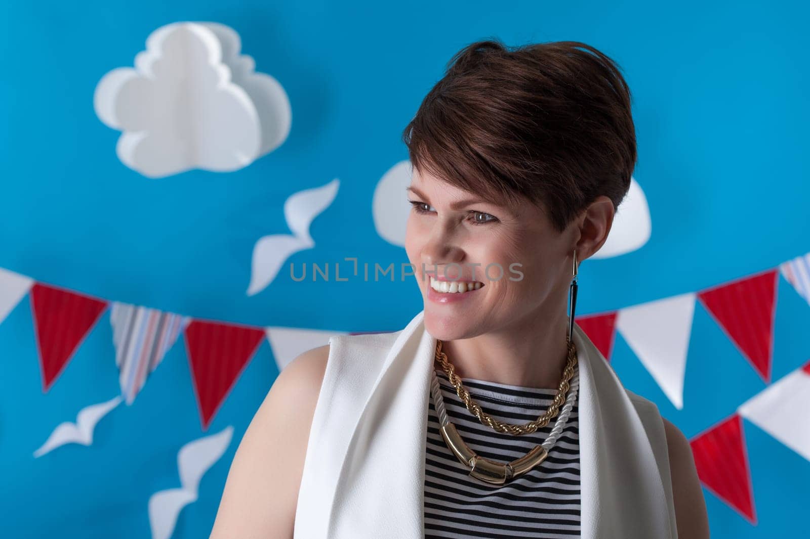 Smiling middle-aged model posing in stylish suit, close-up