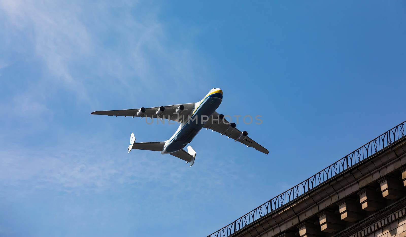 KYIV, UKRAINE - Aug 24, 2021: Celebrating the 30th anniversary of Ukraine independence. The plane Antonov 225 AN-225 Mriya, the biggest airplane in the world in the sky over Kyiv during the parade