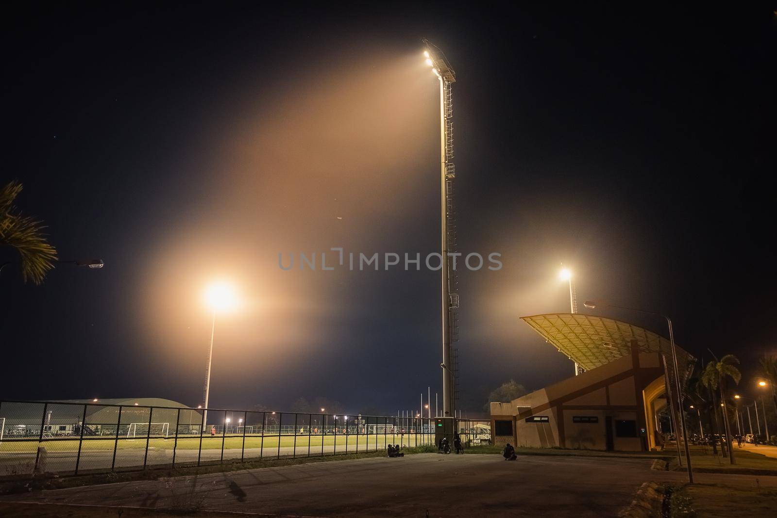 training soccer field with flood light at night light by Wmpix