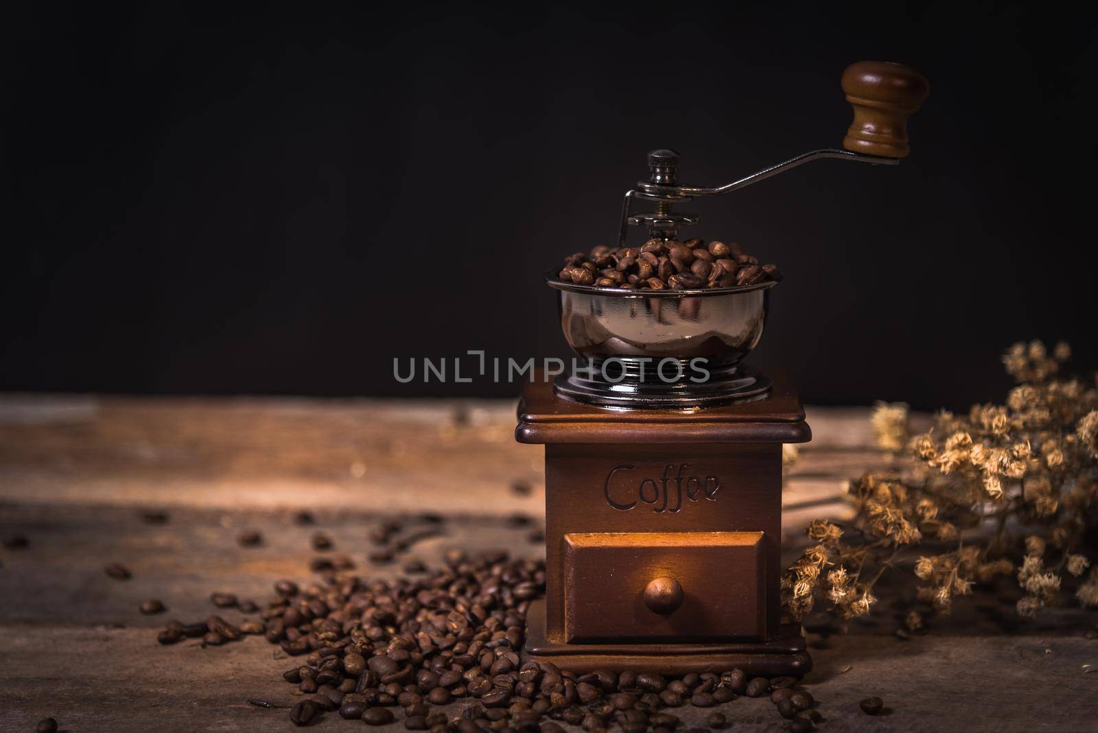 Coffee grinder and coffee beans by Wmpix