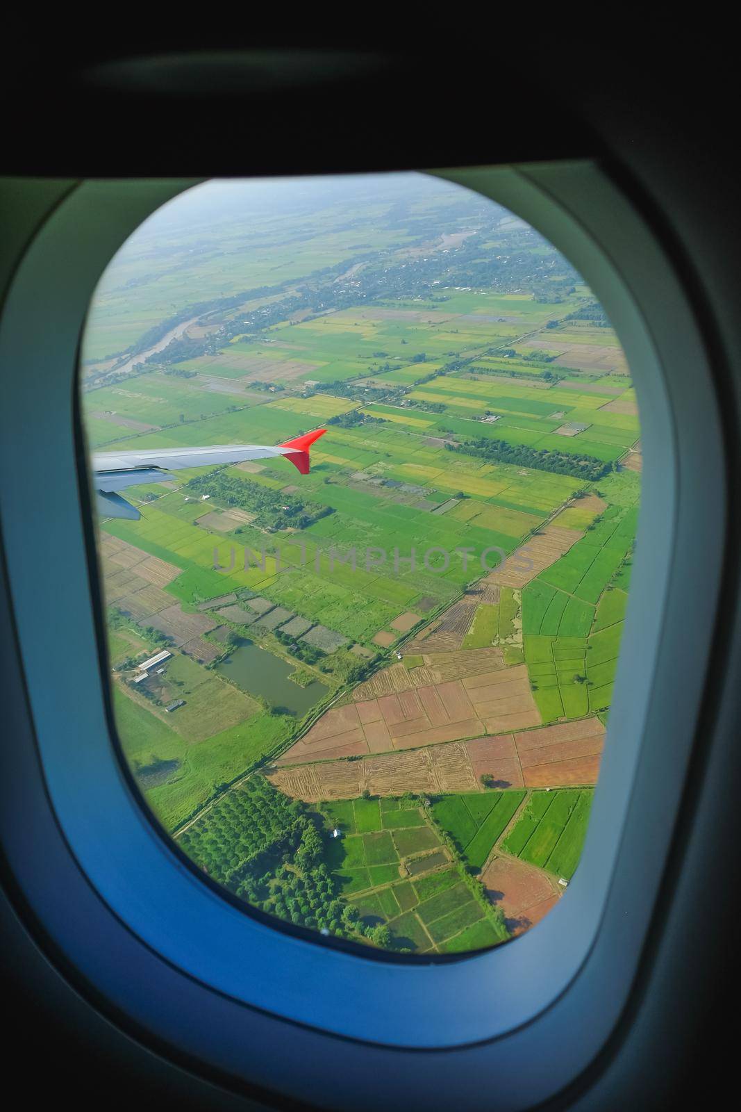 plane window view by Wmpix