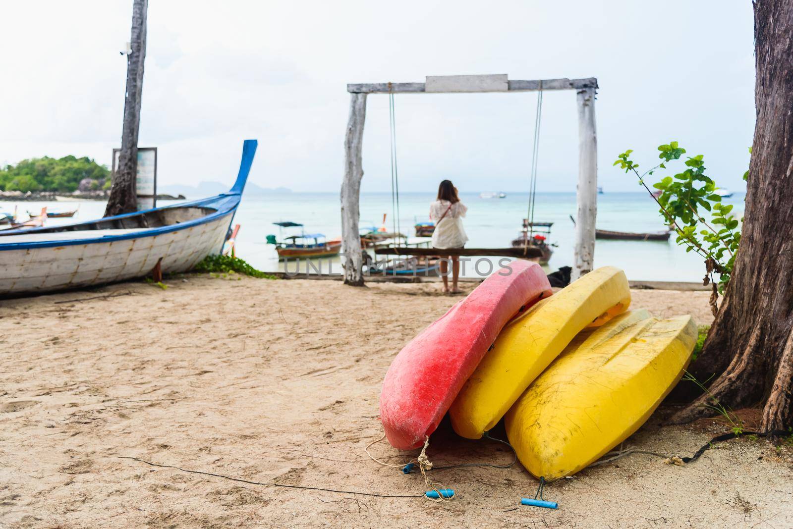 Colorful kayaks on the beach, Thailand
