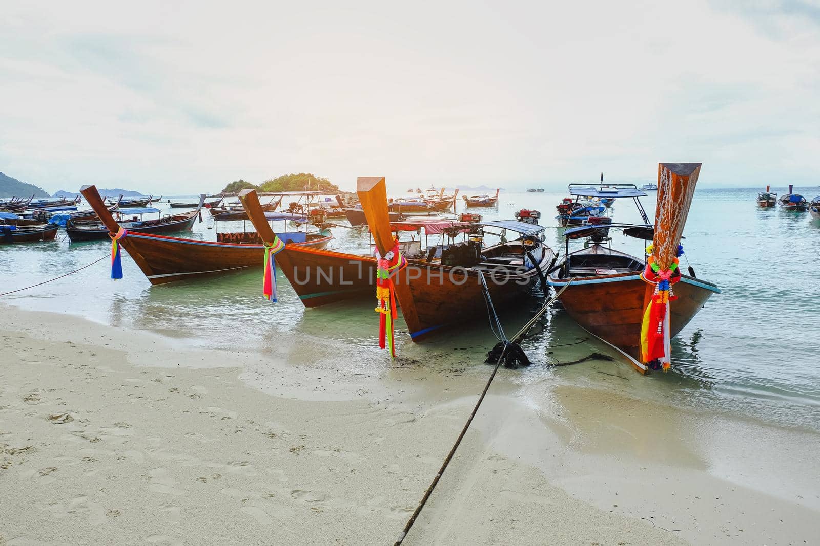 Fishing boat on the beach, lipe island.Thailand by Wmpix