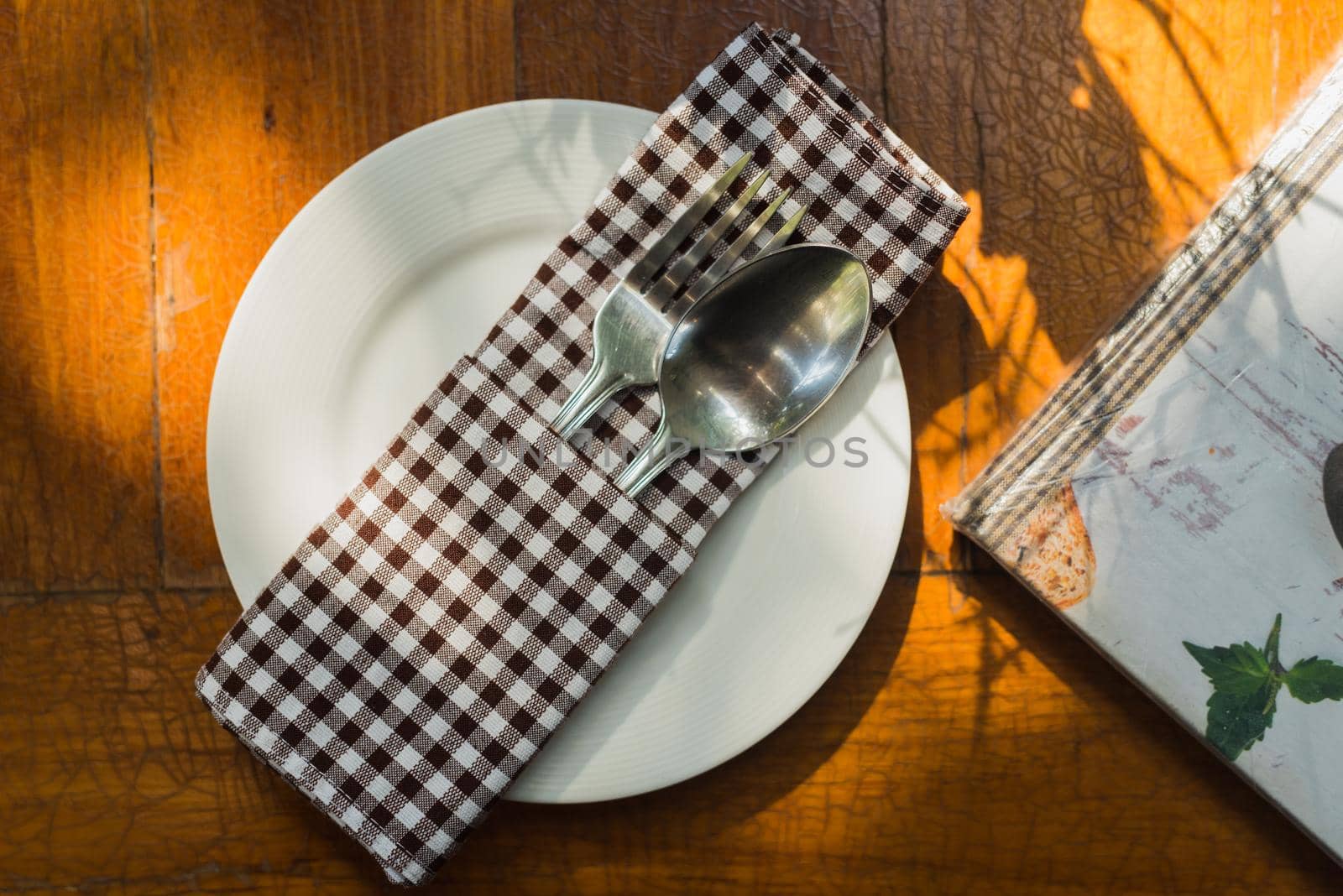 Close up Spoon and For on wood table