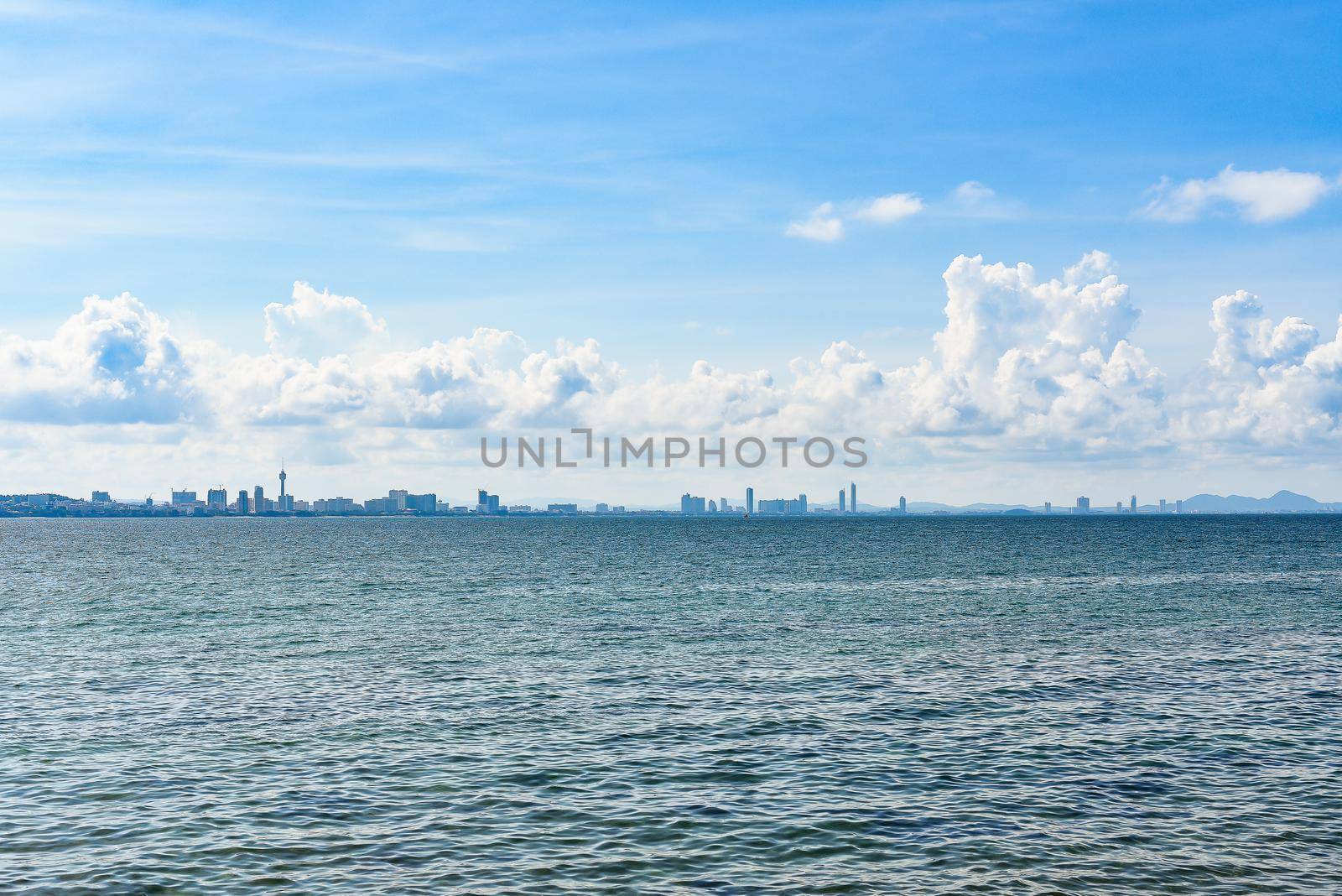 View from the sea of the building and skyscrapers in Pattaya Beach by Wmpix