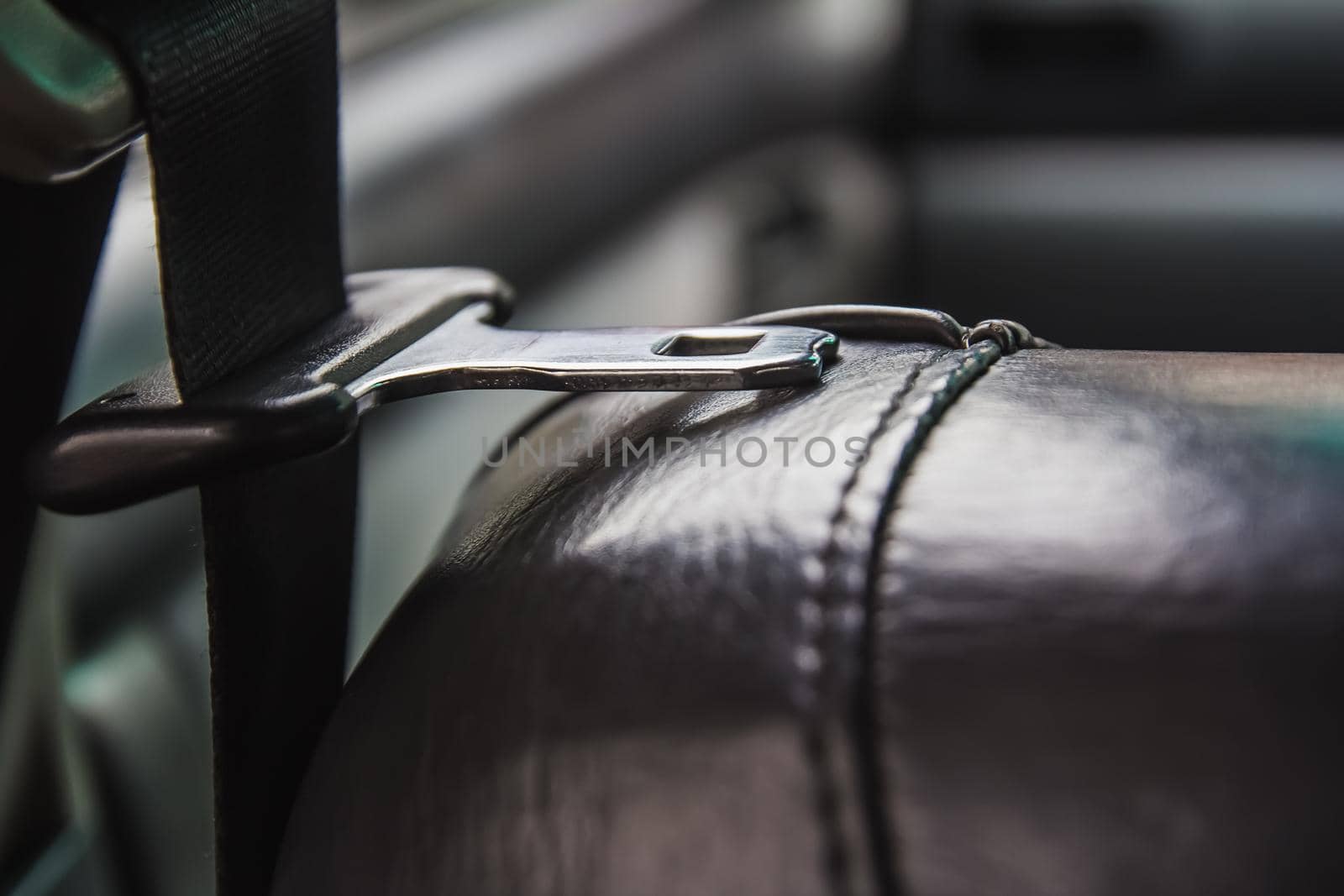 seat belt on a black leather chair