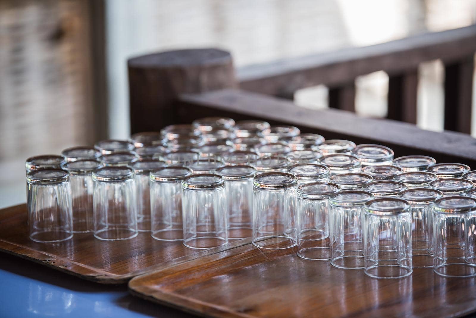 Empty glasses on the table by Wmpix