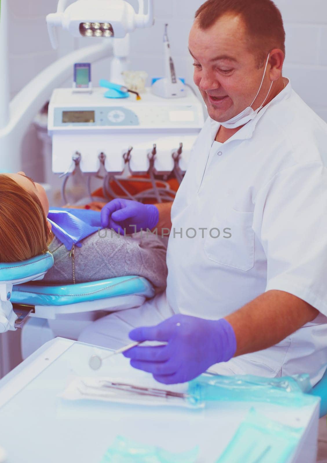 Doctor and patient in the dental clinic.