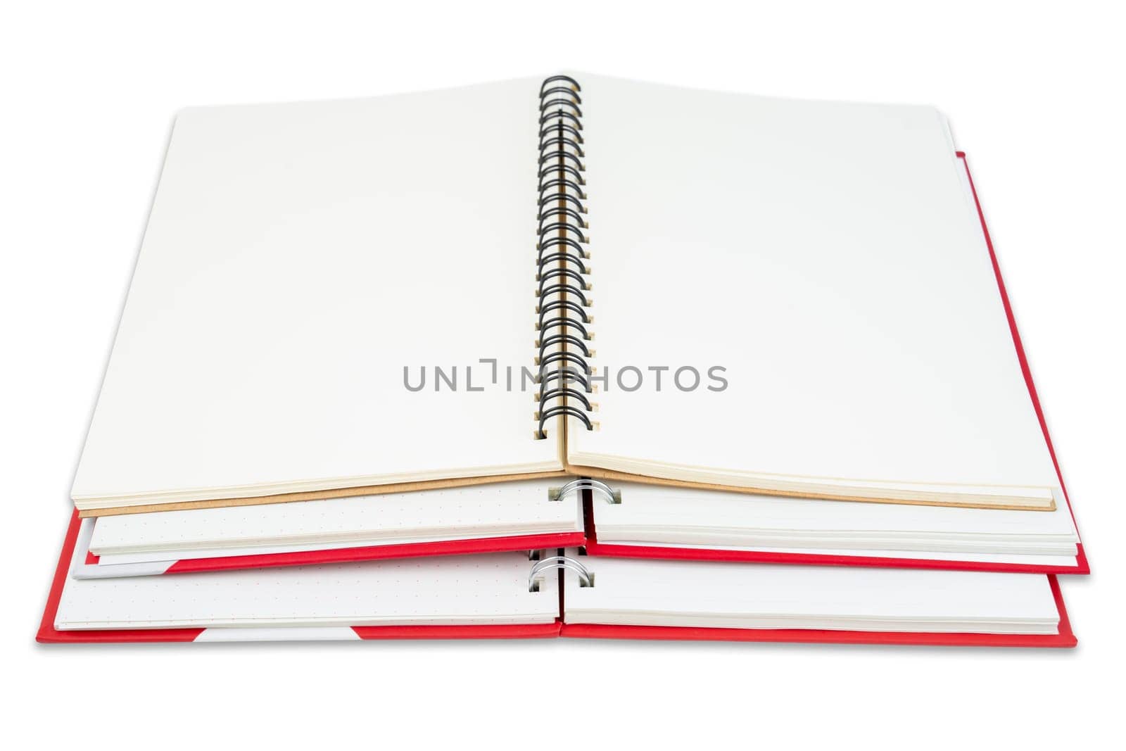 Heap of open book with blank white pages. Clipping path included.