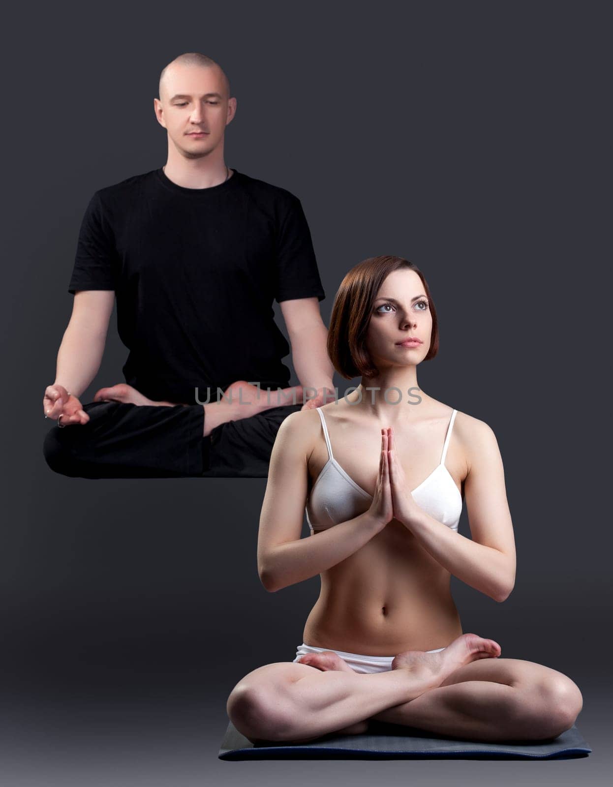 Image of man levitates during yoga in studio