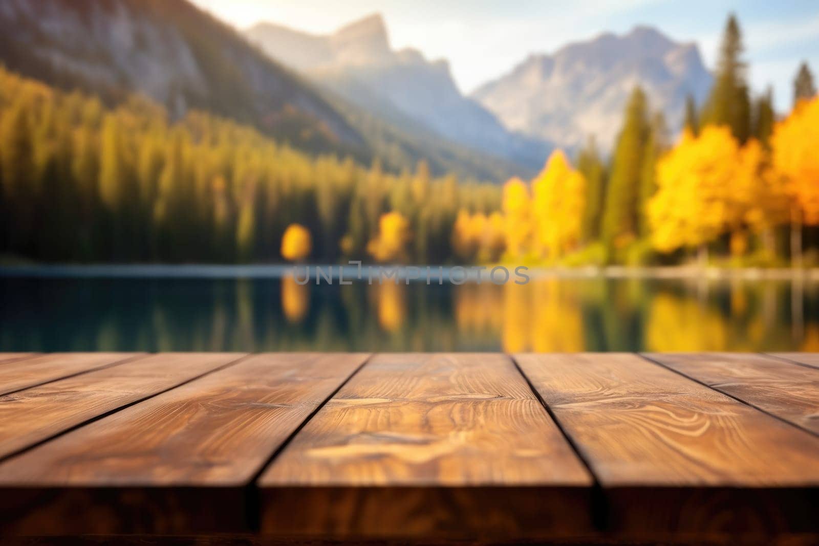 The empty wooden table top with blur background of lake and mountain in autumn. Exuberant image.