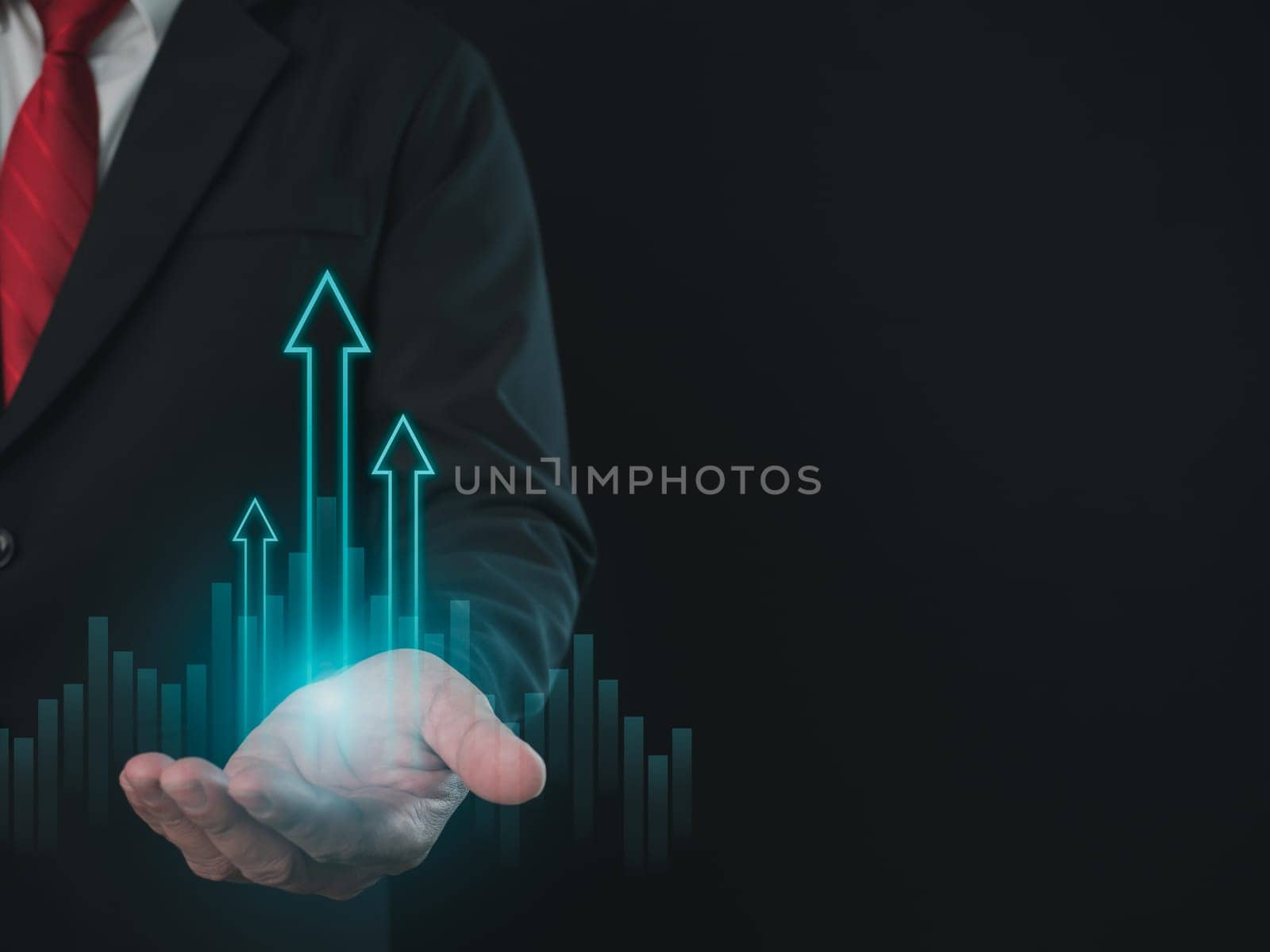 Stock trading. Finance. Investing. Growing business. Businessman in suit showing finger pointing to arrow tip on gray background.