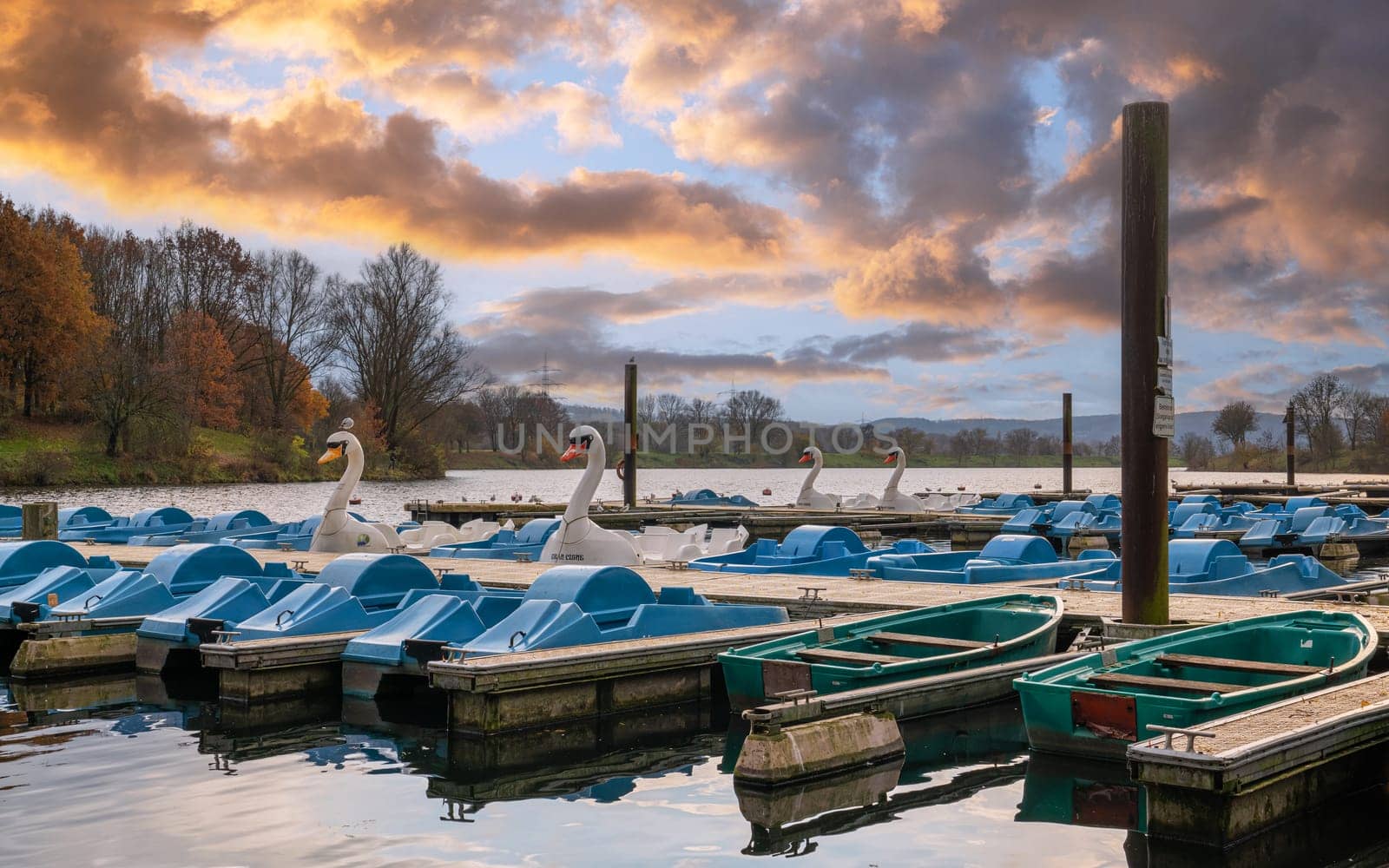 Panoramic image of paddleboats, autumn at the Kemnader lake, North Rhine Westphalia, Germany