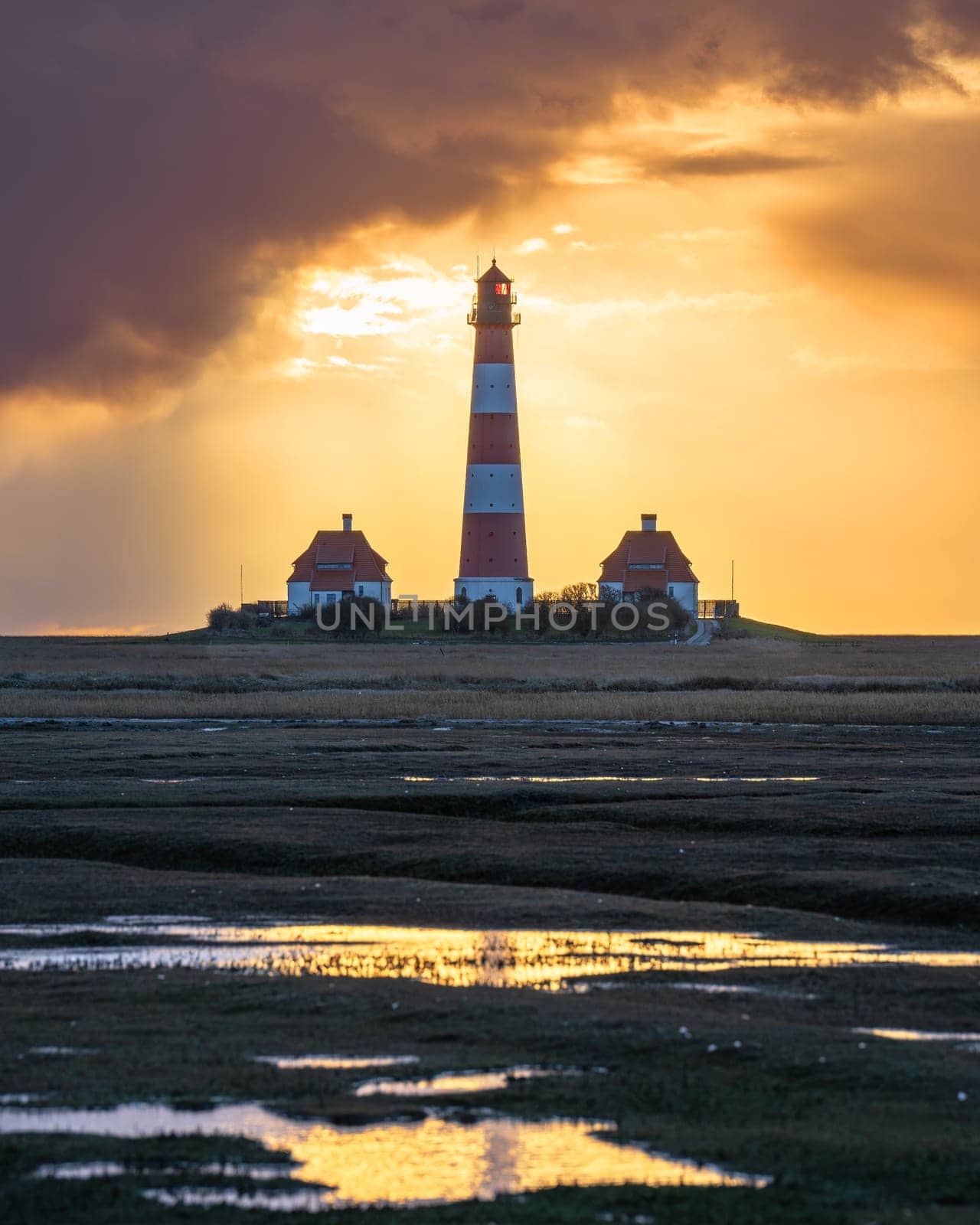 Panoramic image of Westerhever lighthouse against sky, North Frisia, Germany 