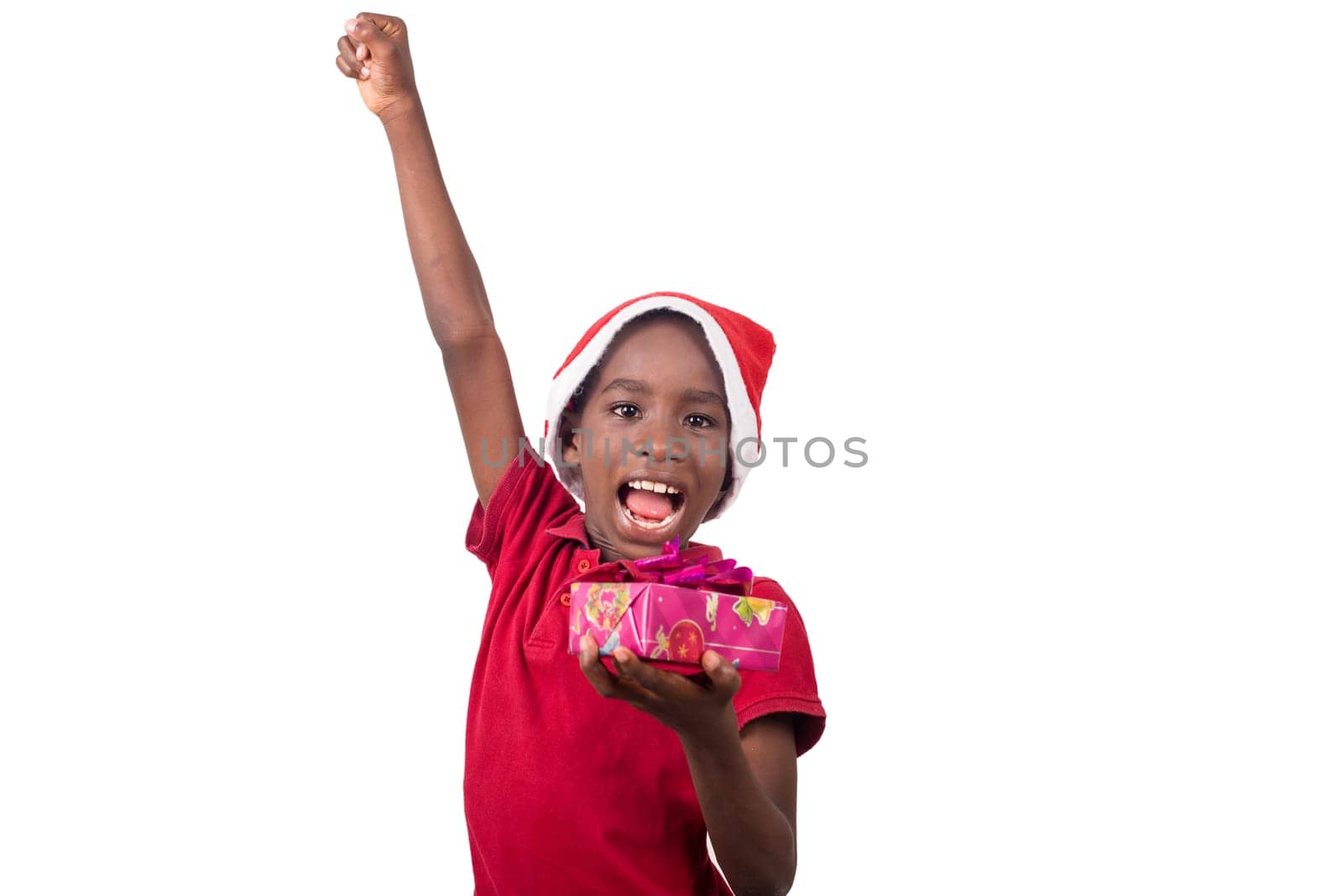 Unpack the Christmas present. Happy childhood concept. Holiday and party tradition. Kid with a Christmas present in hand.