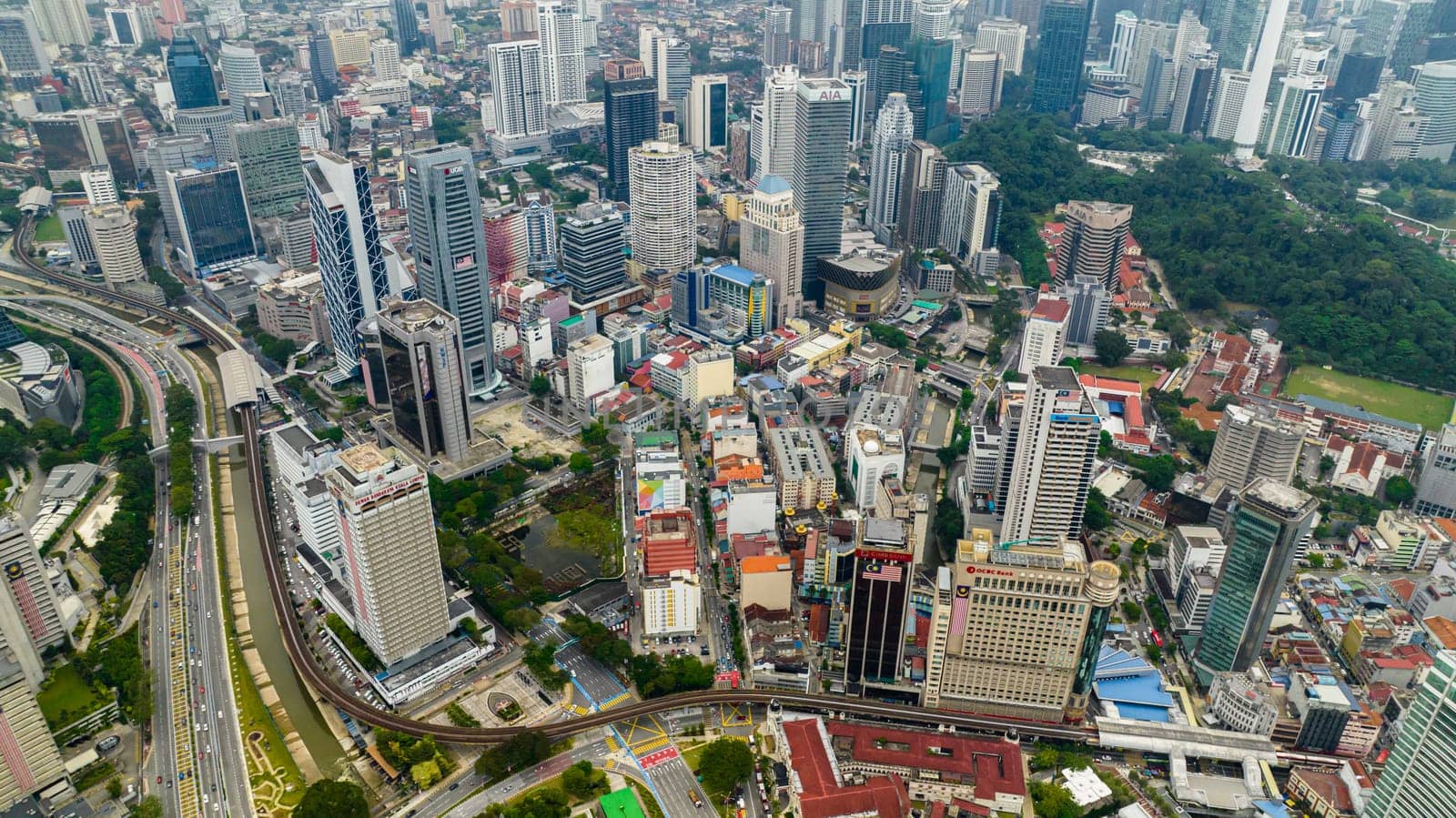 Kuala Lumpur, Malaysia - September 11, 2022: Aerial view of capital of Malaysia is the city of Kuala Lumpur with skyscrapers and high-rise buildings.