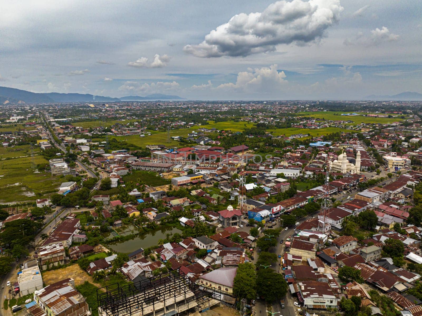 Aerial view of Banda Aceh city with residential areas and houses. Sumatra, Indonesia.