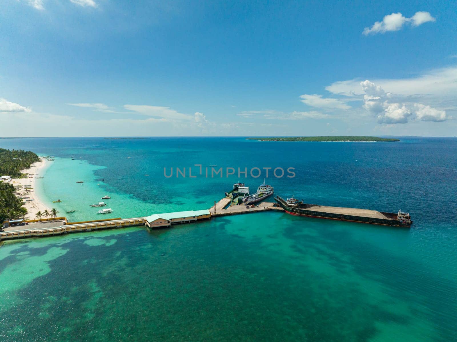 Sea port and ships on a tropical island. Bantayan island, Philippines.