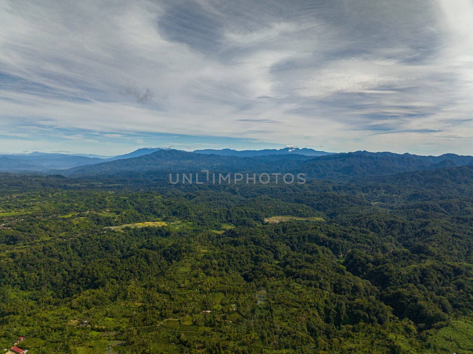 Tropical landscape: mountains and farmland in the tropics. Bukittinggi, Sumatra. Indonesia.