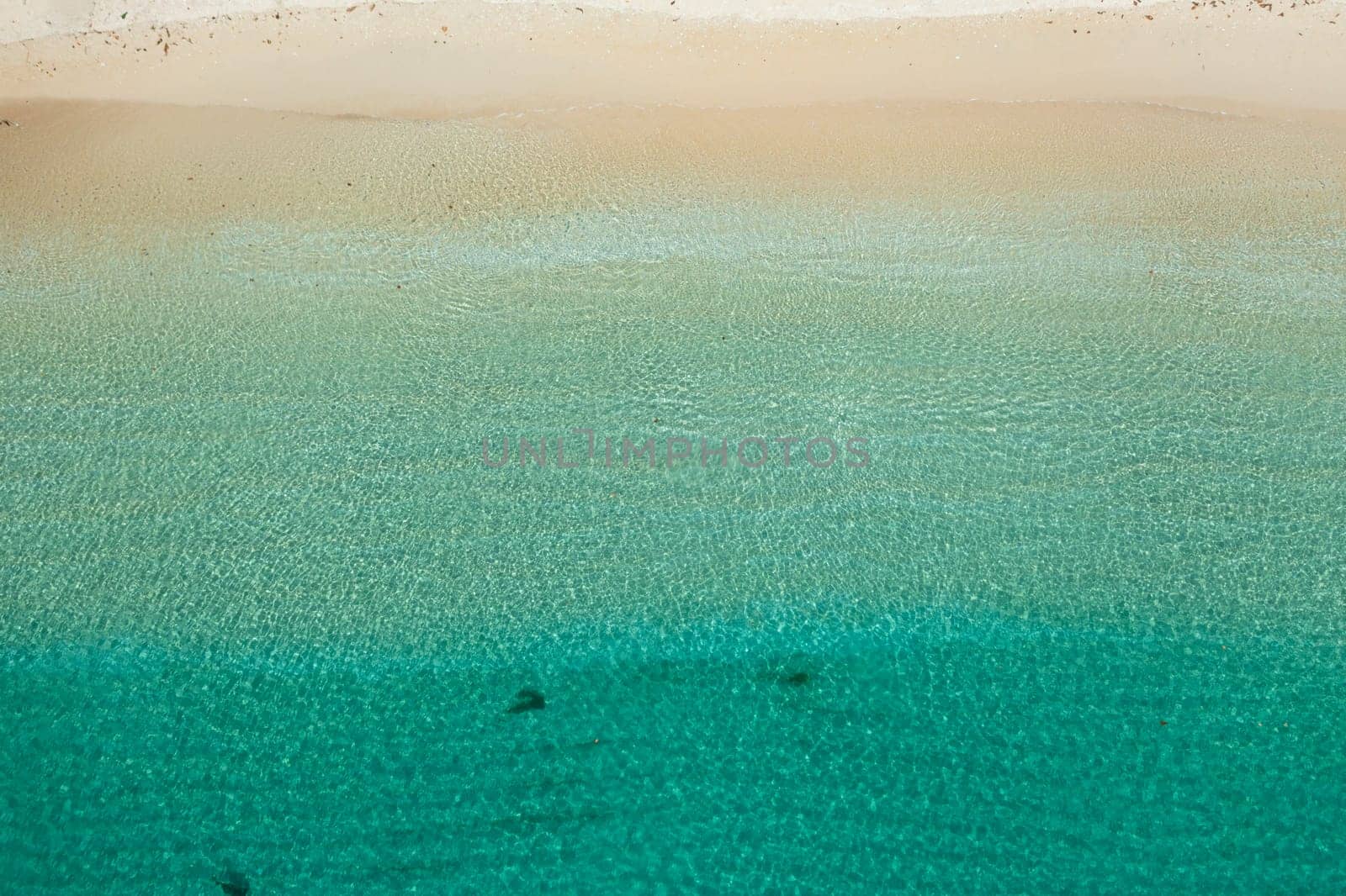 Tropical landscape with a beautiful beach in the blue water. Pagudpud, Ilocos Norte Philippines