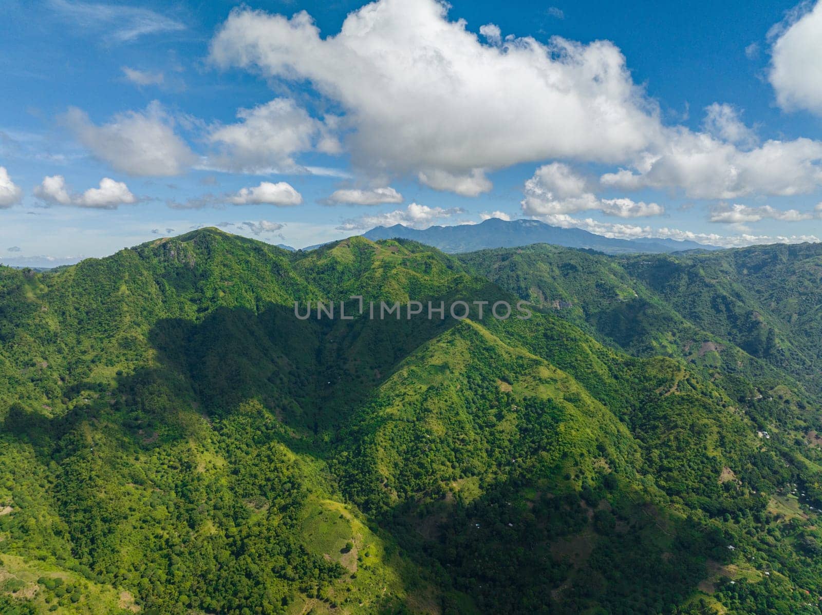 Aerial view of Mountain slopes covered with rainforest and jungle. Negros, Philippines