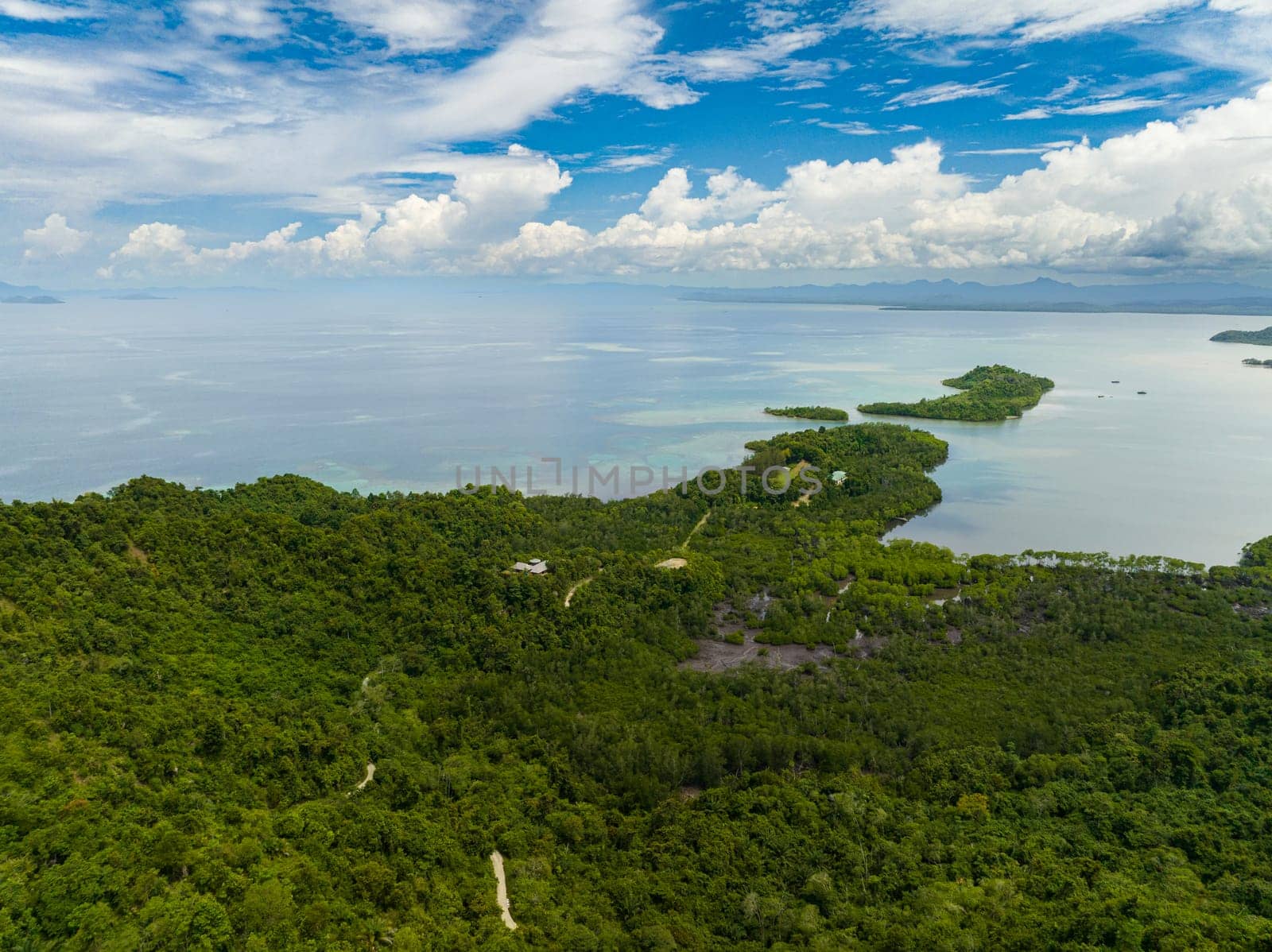 Tropical landscape with islands and bays. Seascape in the tropics. Borneo, Sabah, Malaysia.