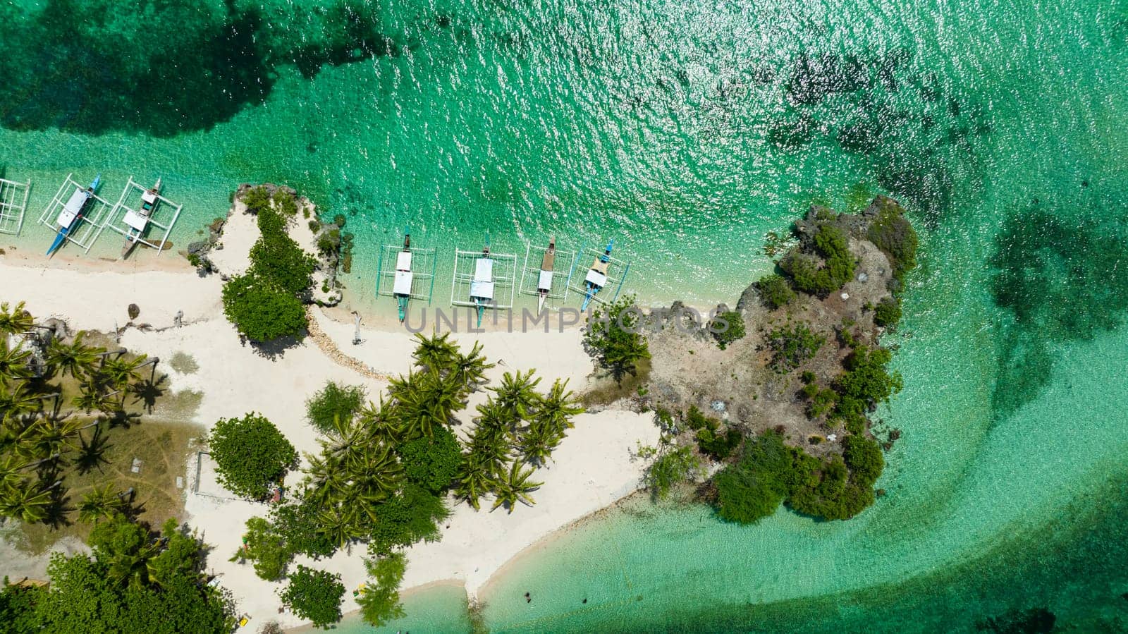 Beautiful sandy beach with palm trees. Bantayan island, Philippines.