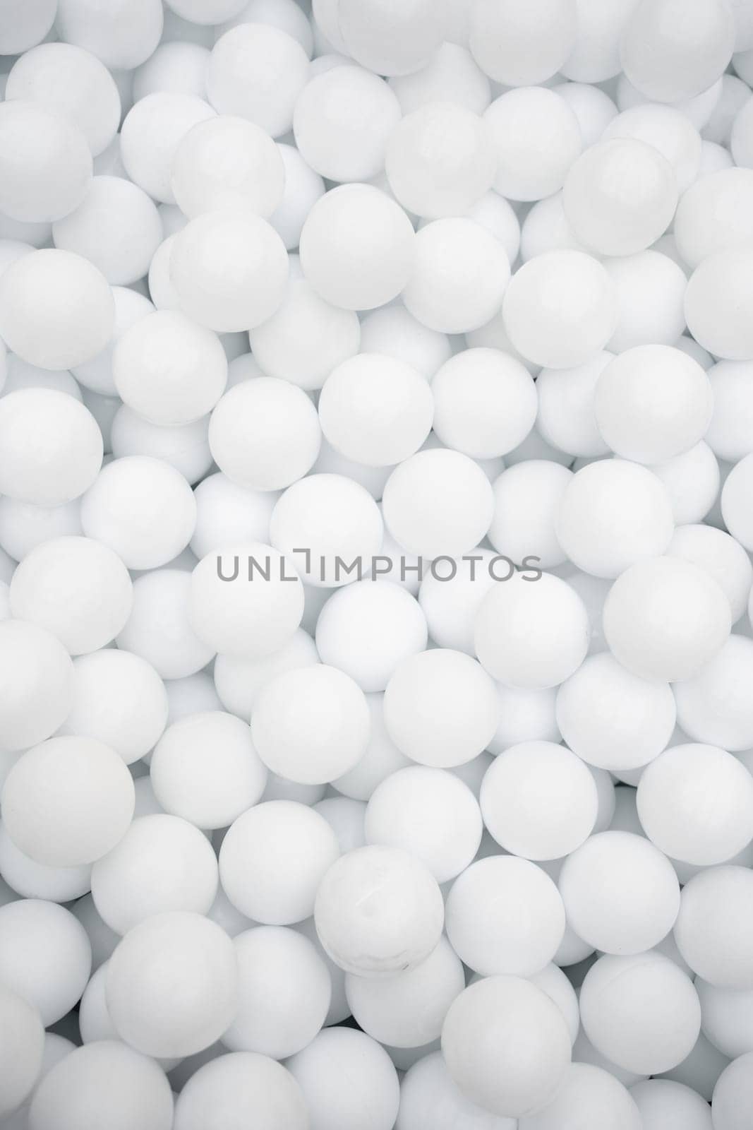 Many white plastic balls for dry pool in amusement park
