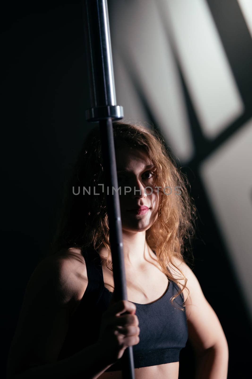 Athletic Beautiful Woman Does Her Cross Fitness, Bodybuilding Gym Training Routine
